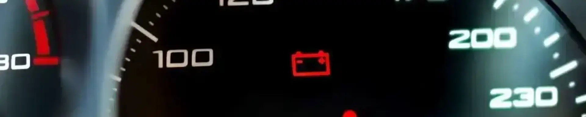 Was tun, wenn die Autobatterie leer ist? Die Grafik zeigt eine Warnleuchte mit einer leeren Autobatterie.